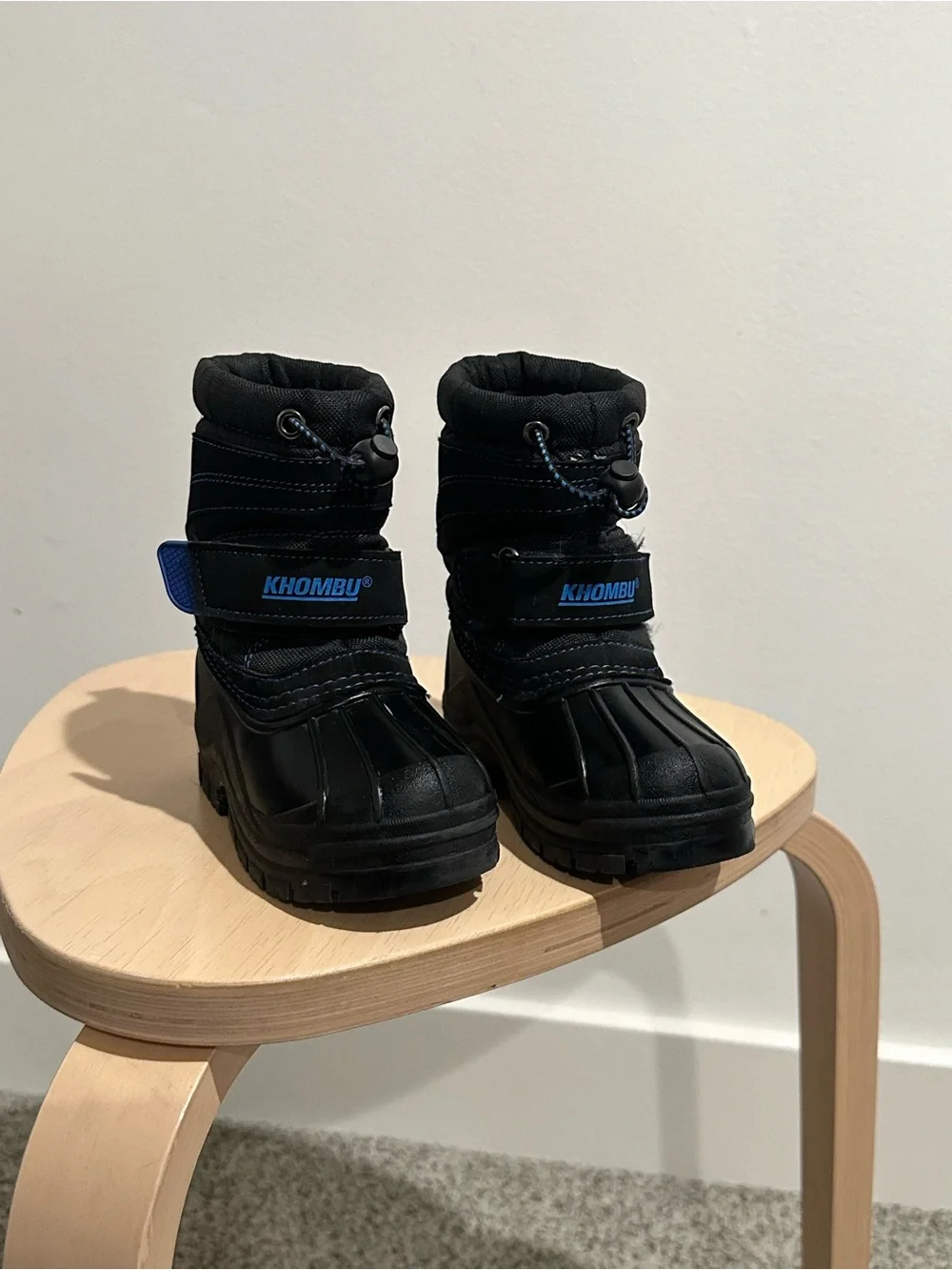 Khombu Kids Black Snow Boots with Blue Logo Accent
